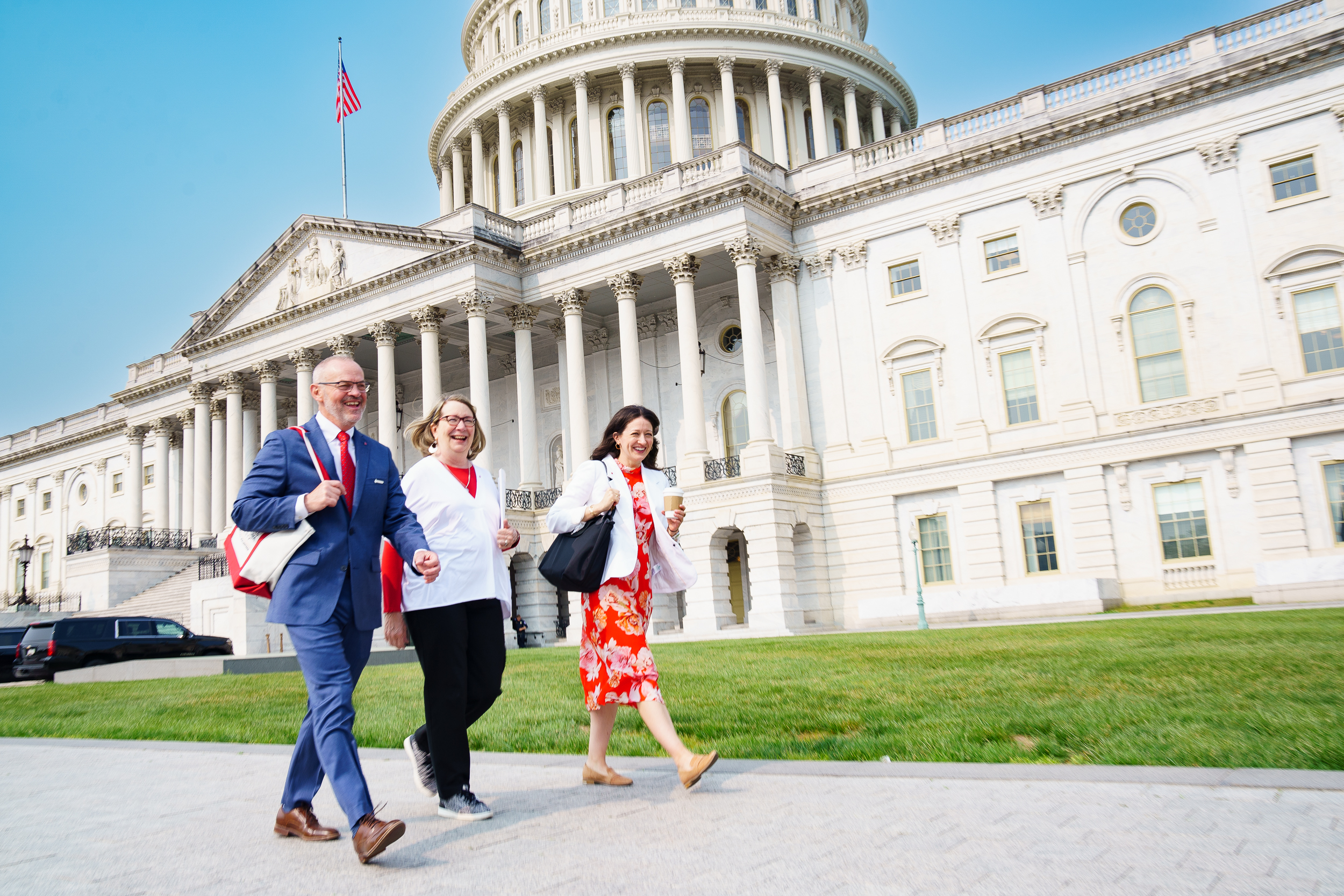 Advocates walking in front of the U.S. Capitol