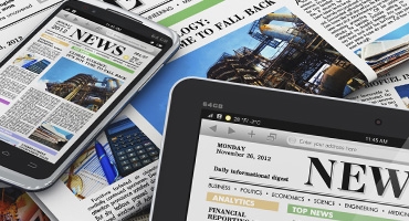 An image depicting tablets and laptops with text that reads news