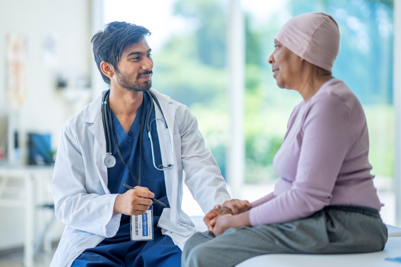 Doctor and patient speaking in exam room