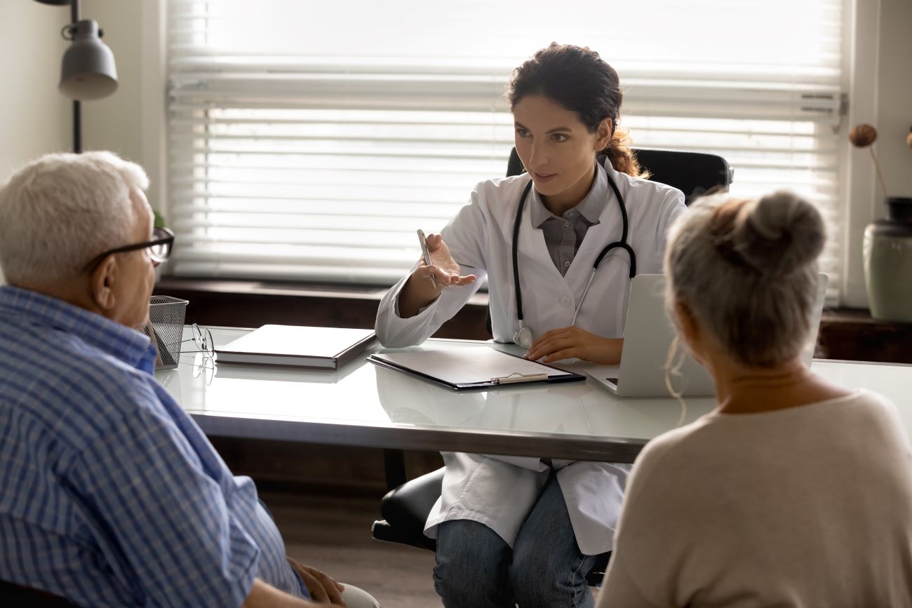 Doctor with senior couple