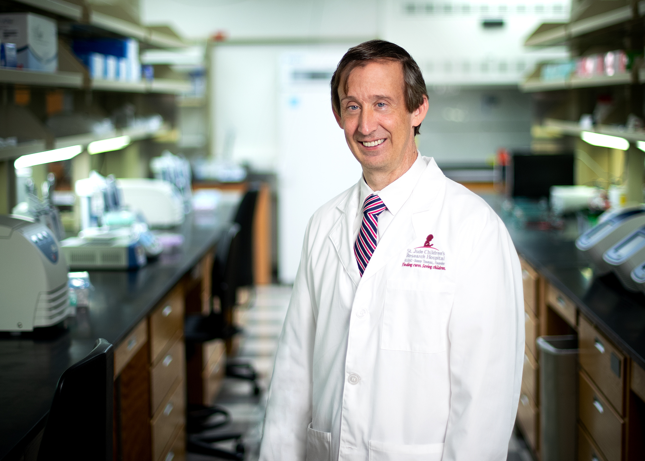 John Crispino, Ph.D., of St. Jude Children’s Research Hospital, stands for a photo in a laboratory.