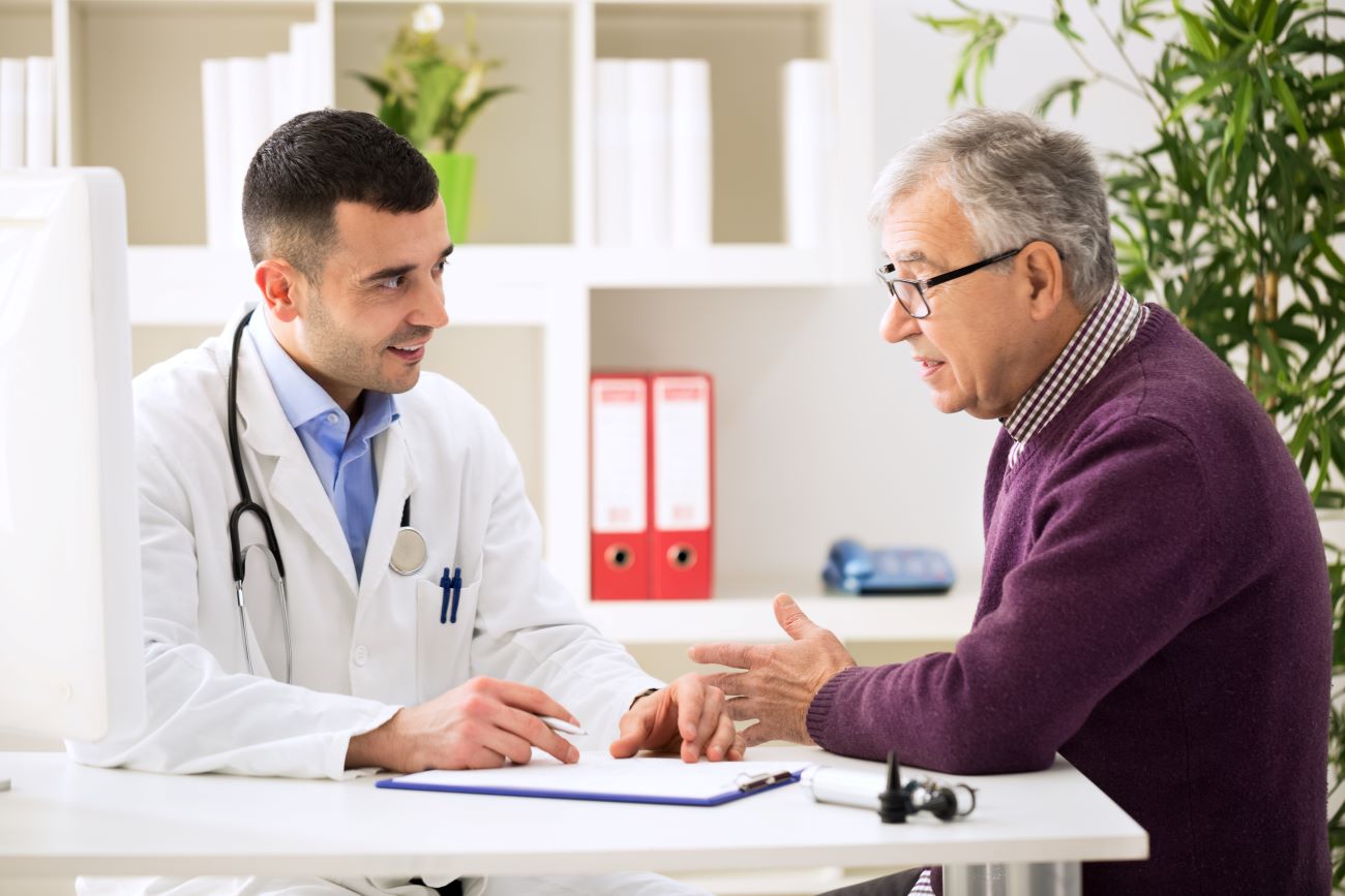 Doctor speaking to patient about treatment
