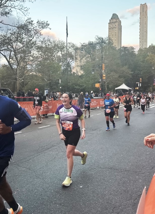 young white woman running team in training