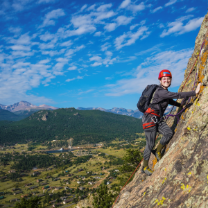 Mara HL survivor climbing mountain