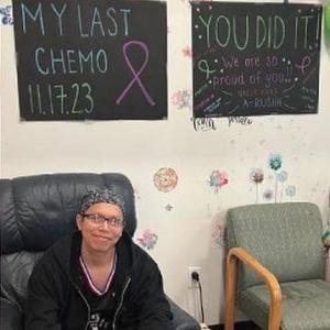 young blood cancer patient sitting in chair