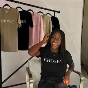 lymphoma chosen shirt in chair behind the scenes of photo shoot
