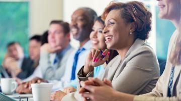 Nurses sitting around table at CE program