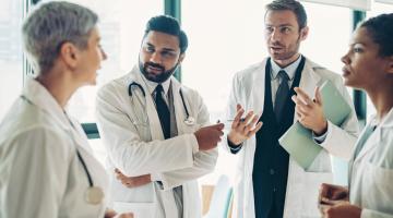 Healthcare professionals speaking with eachother