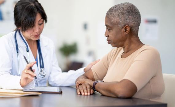 Doctor talking to patient