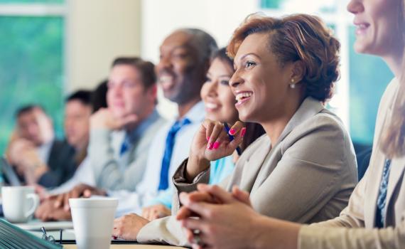 Healthcare professionals having a discussion at a table
