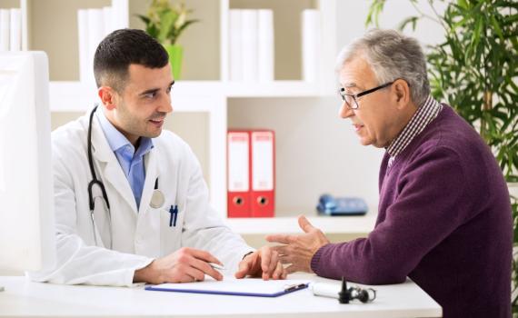 Doctor speaking to patient about treatment