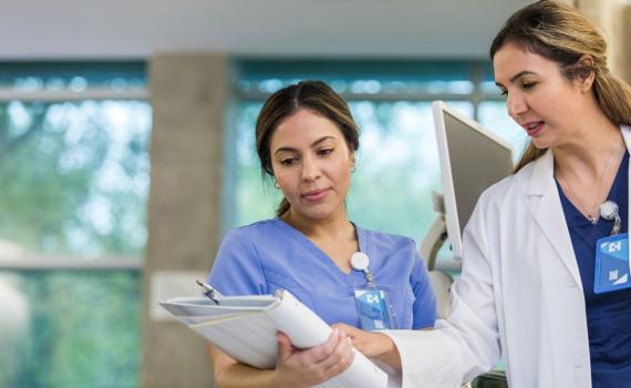 Nurse and doctor speaking