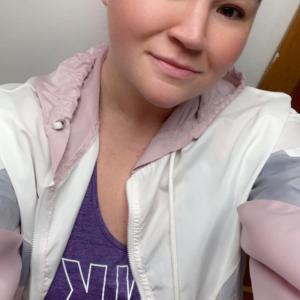 diffuse large B-cell lymphoma, woman, white, bald, purple top