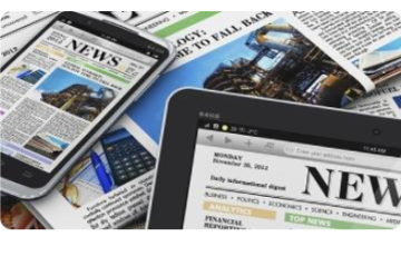 An image with the word "news" on tablets and a laptop