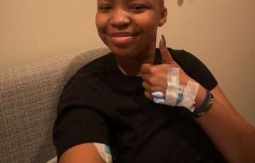 matilda lymphoma black shirt thumbs up world cancer day