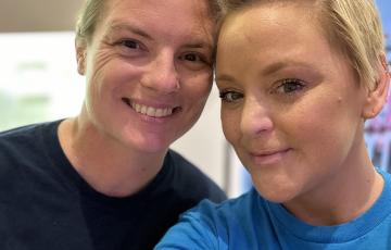 two participants at Light The Night celebrating and acknowledging their cancer experience